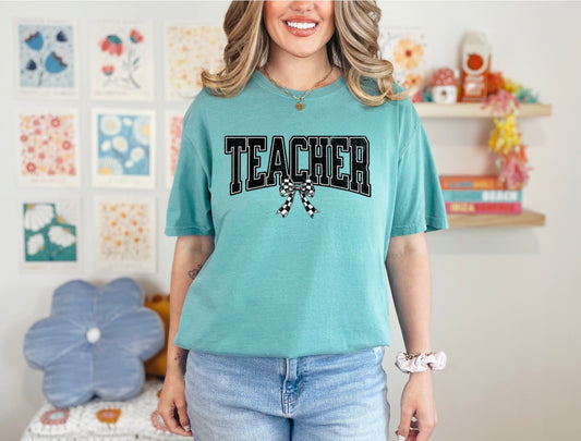 Teacher w/checkered bow